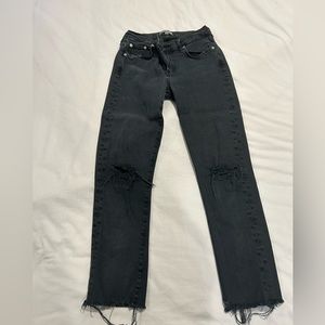 AGOLDE Toni in washed black with distressing at knees and hem